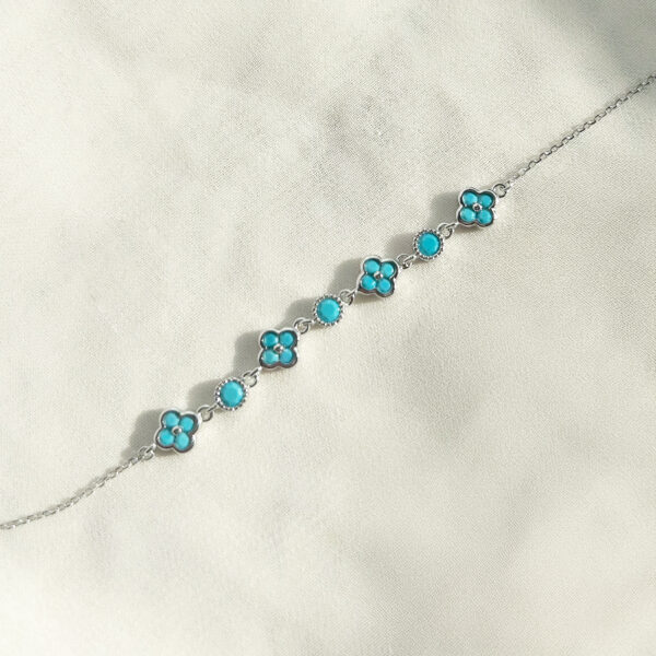 PULSERA CLOVER RODINADA DE ZIRCON DE VARIOS COLORES