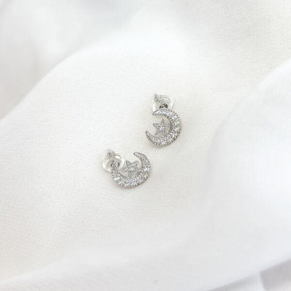 ARETE DE LUNA Y ESTRELLA CON PUNTITOS Y ZIRCONES