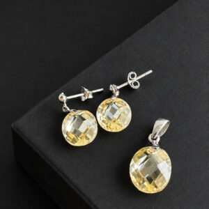 ARETE Y DIJE OVALOS CON ZAFIRO AMARILLO