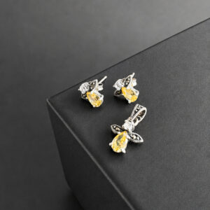ARETE Y DIJE DE ANGELITO CON ZIRCON Y ZAFIRO AMARILLO
